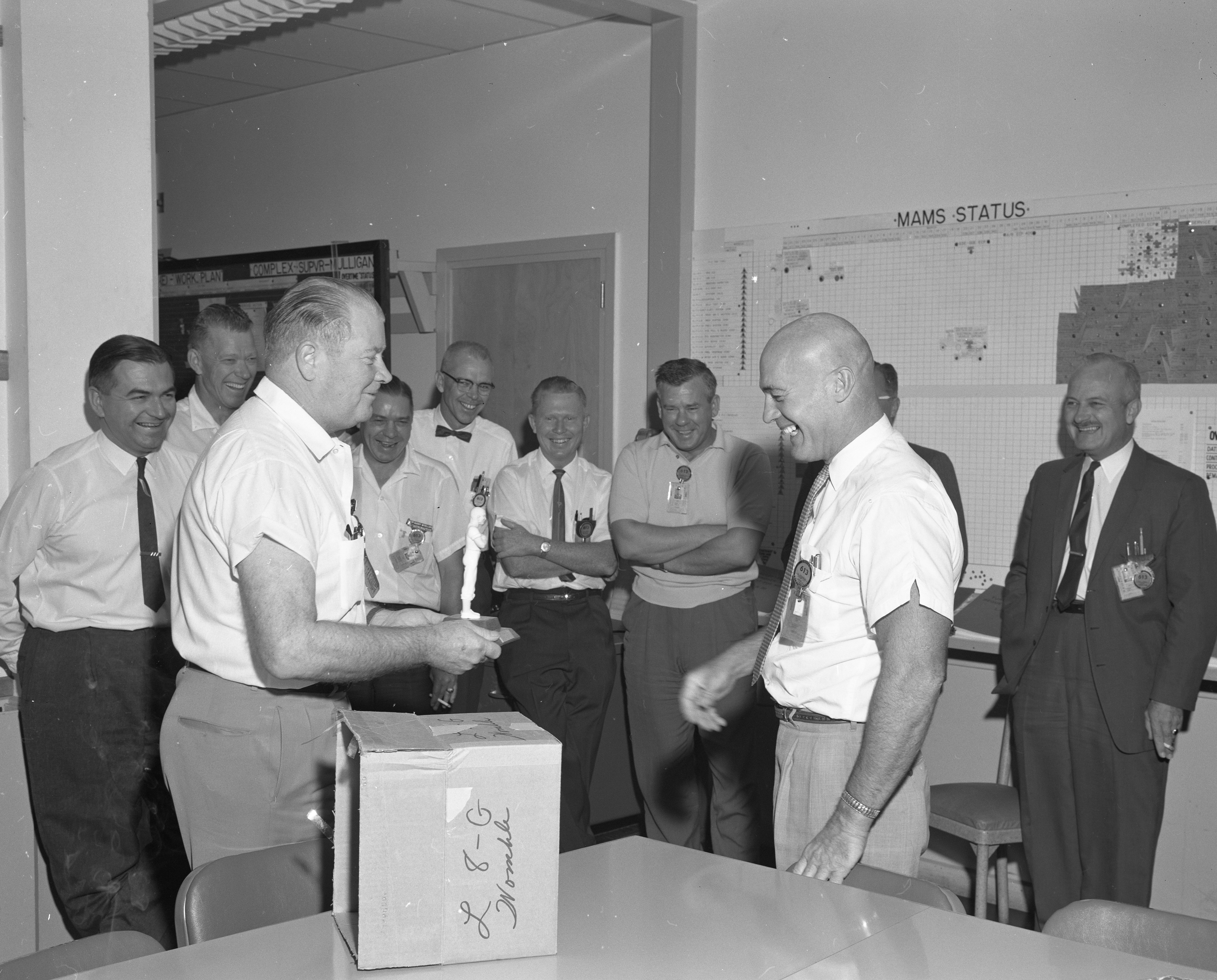 Mike Biagi presenting a Mr. Clean trophy to Chief of Complex R. Franklin on August 14th, 1961. 